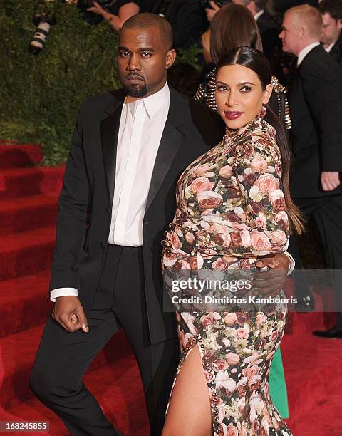 Kim Kardashian and Kanye West attend the 2013 Costume Institute Gala - PUNK: Chaos to Couture at Metropolitan Museum of Art on May 6, 2013 in New...