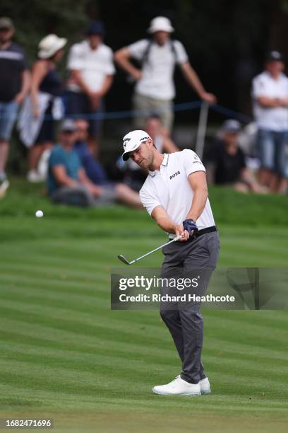 Thomas Detry of Belgium chips onto the 18th green on Day Two of the BMW PGA Championship at Wentworth Golf Club on September 15, 2023 in Virginia...