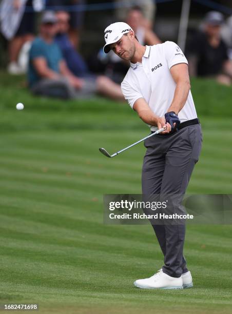 Thomas Detry of Belgium chips onto the 18th green on Day Two of the BMW PGA Championship at Wentworth Golf Club on September 15, 2023 in Virginia...