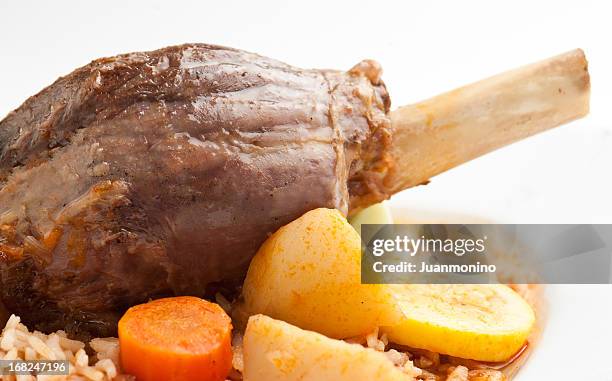 lamb shank with rice and vegetables - lamb shank stock pictures, royalty-free photos & images