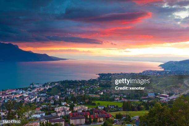 sunrise over the cities of montreux and lausanne - montreux stock pictures, royalty-free photos & images