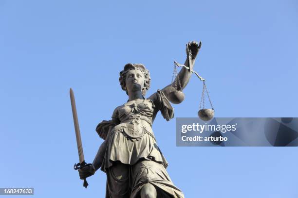 lady justice against blue sky - lady justice stock pictures, royalty-free photos & images