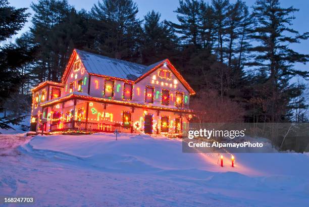 rural house with christmas/winter season lights - ii - country christmas stock pictures, royalty-free photos & images