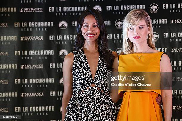 Actresses Zoe Saldana and Alice Eve attend a photocall to promote the new film "Star Trek Into Darkness" at Four Seasons Hotel on May 7, 2013 in...