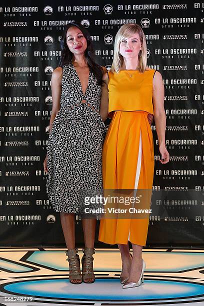 Actresses Zoe Saldana and Alice Eve attend a photocall to promote the new film "Star Trek Into Darkness" at Four Seasons Hotel on May 7, 2013 in...