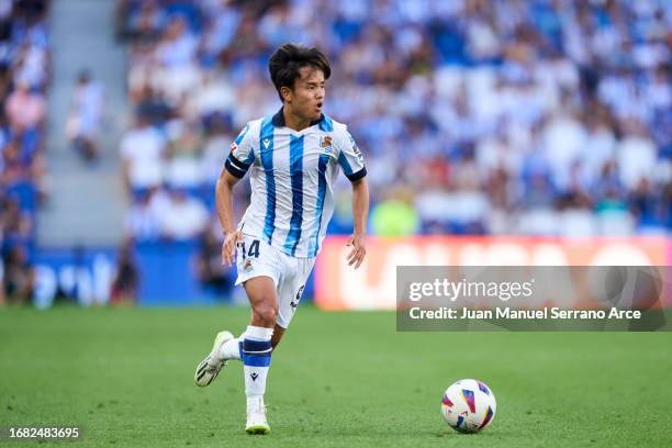 Takefusa Kubo of Real Sociedad in action during the LaLiga EA Sports match between Real Sociedad and Celta Vigo at Reale Arena on August 19, 2023 in...