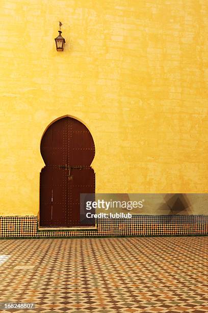 traditional moroccan door inside the mausoleum of moulay ismail - moroccan tile stock pictures, royalty-free photos & images