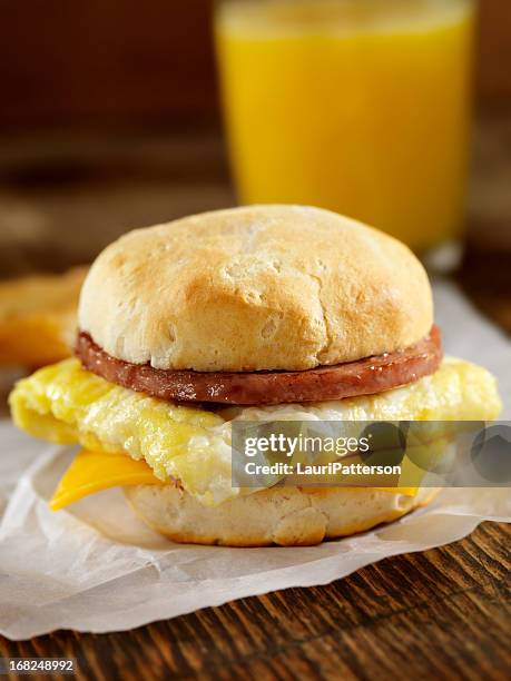 sausage and egg breakfast sandwich - breakfast sausage stock pictures, royalty-free photos & images