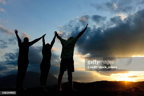 friendship - three people silhouette stock pictures, royalty-free photos & images