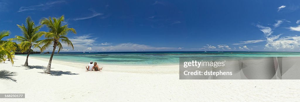 Young couple relaxing on beach