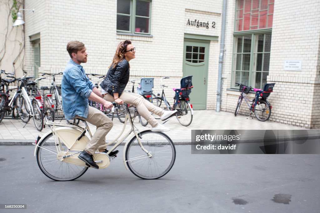 Romantic Couple Riding a Bicycle