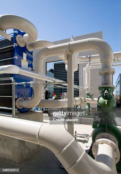 pumps, pipes and cooling towers for hvac system. - cooling tower stock pictures, royalty-free photos & images