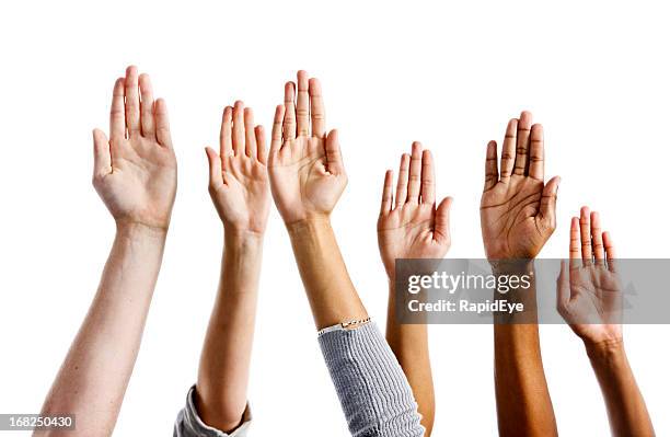 six mixed hands raised against white background - hands in the air stock pictures, royalty-free photos & images