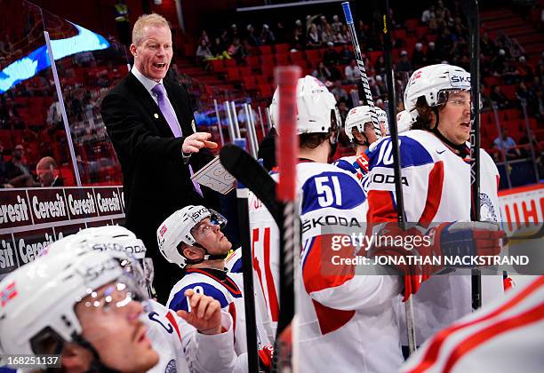 Norway's head coach Roy Johansen reacts during the preliminary round match Canada vs Norway at the 2013 IIHF Ice Hockey World Championships on May 7,...