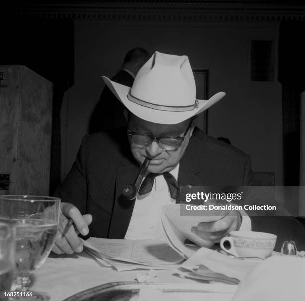 Entertainer Tex Ritter attends a luncheon and recording session for the Country Music Association for the promotional album "The Sounds Of Country...