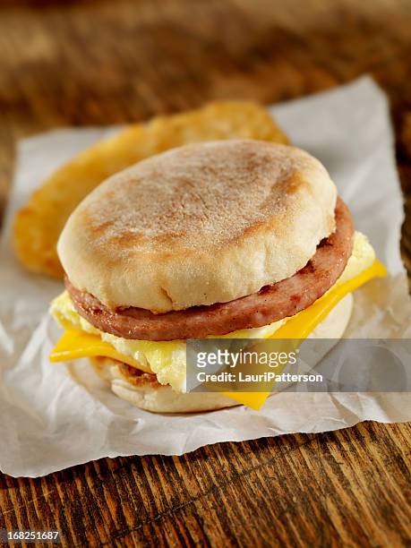 sausage and egg breakfast sandwich - english muffin stock pictures, royalty-free photos & images
