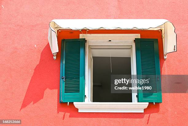 window and red wall - open window frame stock pictures, royalty-free photos & images