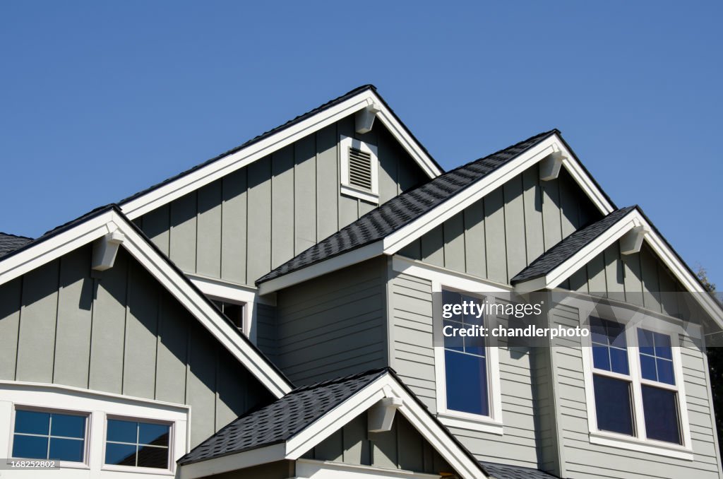 The exterior of a house's second floor during the day