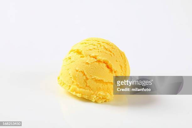 scoop of lemon icecream - sorbet isolated stock pictures, royalty-free photos & images