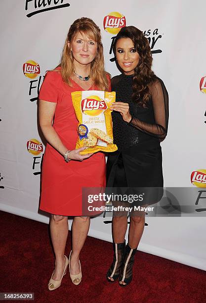 Contest winner Karen Weber-Mendham and actress Eva Longoria attend the Eva Longoria announces contest winner for 'Lay's 'Do Us A Flavor' Contest at...