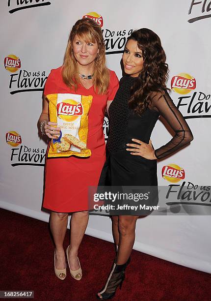 Contest winner Karen Weber-Mendham and actress Eva Longoria attend the Eva Longoria announces contest winner for 'Lay's 'Do Us A Flavor' Contest at...