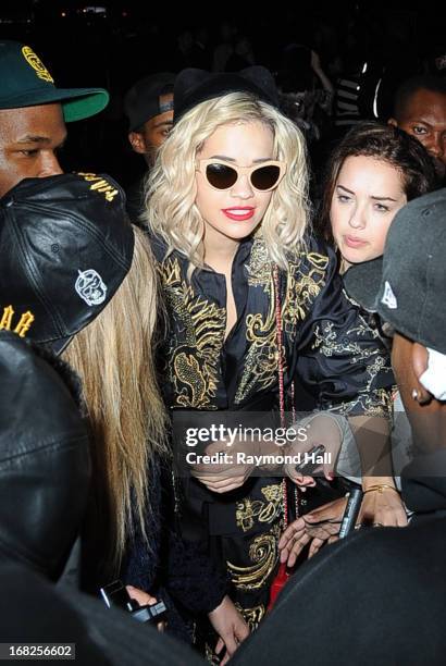 Model Cara Delevingne and singer Rita Ora leave the 'PUNK: Chaos To Couture' Costume Institute Gala after party at the Standard Hotel on May 6, 2013...