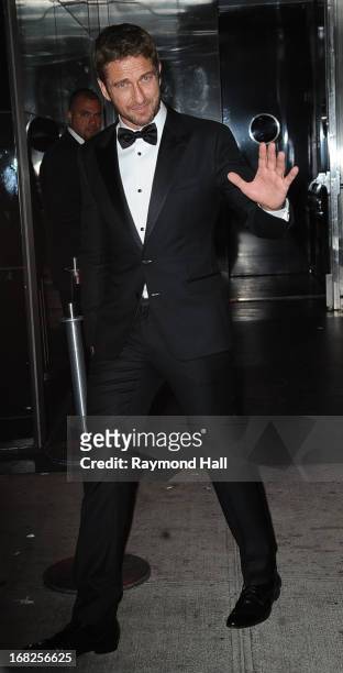 Actor Gerard Butler leaves the 'PUNK: Chaos To Couture' Costume Institute Gala after party at the Standard Hotel on May 6, 2013 in New York City.