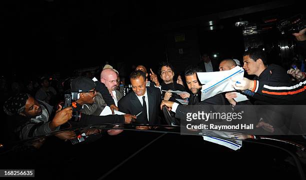 Professional golfer Tiger Woods leave the 'PUNK: Chaos To Couture' Costume Institute Gala after party at the Standard Hotelon May 6, 2013 in New York...