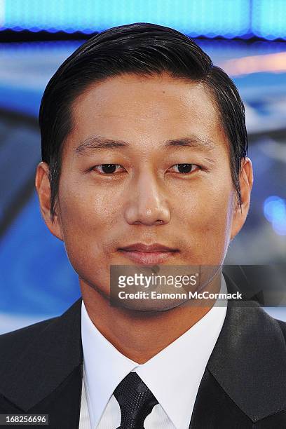 Sung Kang attends the World Premiere of 'Fast & Furious 6' at Empire Leicester Square on May 7, 2013 in London, England.