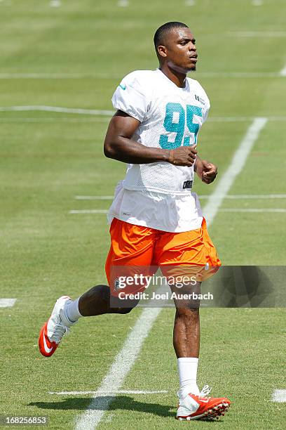 Dion Jordan of the Miami Dolphins runs during rookie camp on May 3, 2013 at the Miami Dolphins training facility in Davie, Florida.