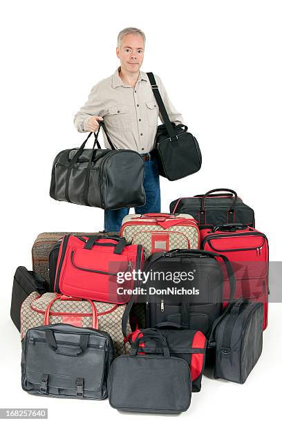 man with a lot of luggage - carrying luggage stock pictures, royalty-free photos & images