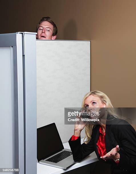 creepy young man eavesdropping - peeking cubicle stock pictures, royalty-free photos & images