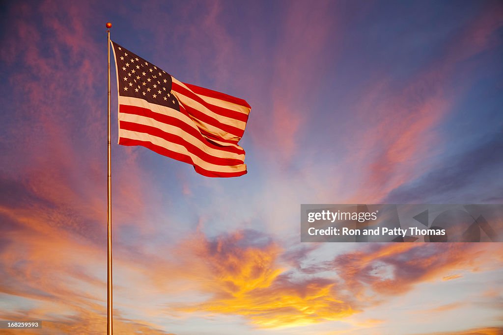 American Flag glows in the sunset. (P)