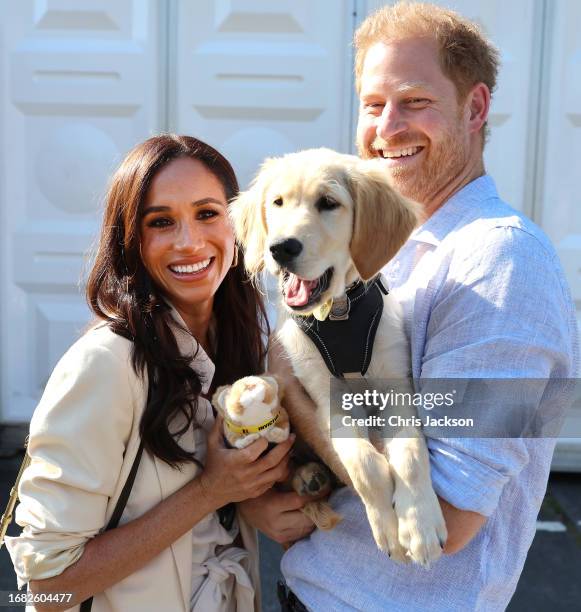 Meghan, Duchess of Sussex and Prince Harry, Duke of Sussex attend the Time Trial & Criterium Cycling at the Cycling Track during day six of the...