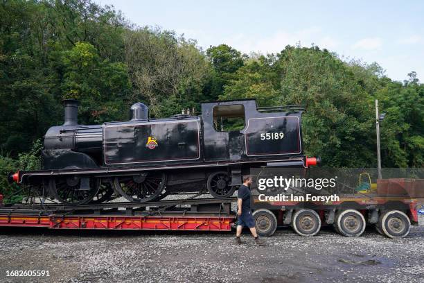 The Caledonian Railway 2P No. 55189 locomotive is unloaded from a low-loader lorry at a North Yorks Moors Railway depot on September 15, 2023 in...