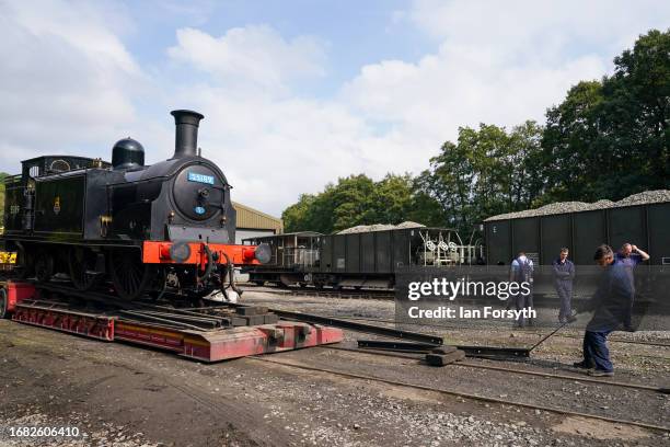 The Caledonian Railway 2P No. 55189 locomotive is unloaded from a low-loader lorry at a North Yorks Moors Railway depot on September 15, 2023 in...