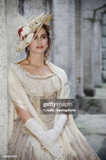 victorian woman looking away - victorian-period-costume stock pictures, royalty-free photos & images