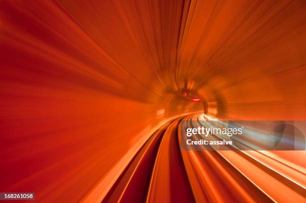 red speed tunnel - high speed train stock pictures, royalty-free photos & images