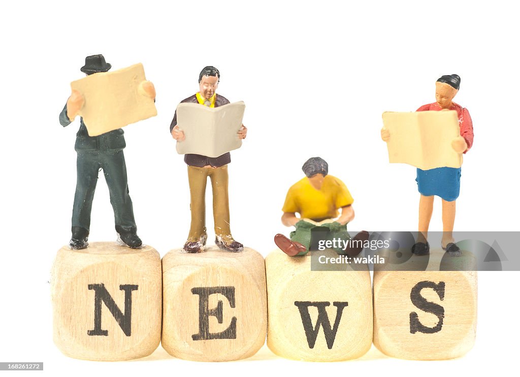 News abstract with figurines