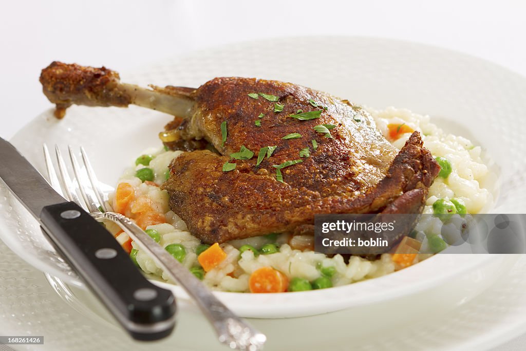 Duck Confit with Vegetable Risotto