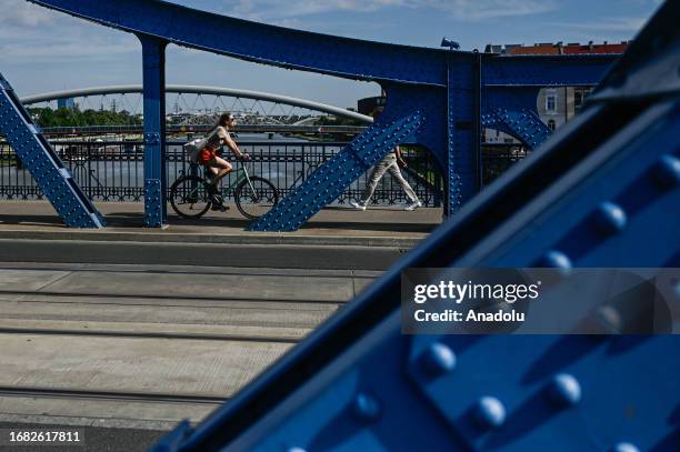 People ride on tram as the city offers free rides during the European Car Free day in Krakow, Poland on September 22, 2023. On the European Car free...