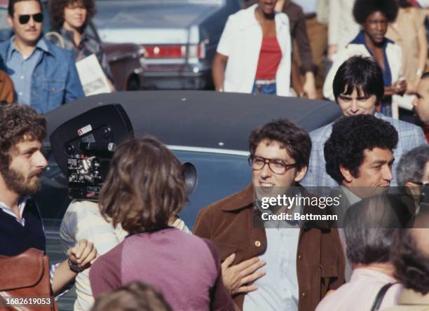 Political activist Mark Rudd stops to talk to a reporter on arrival at the office of the Manhattan District Attorney, New York, September 14th 1977....