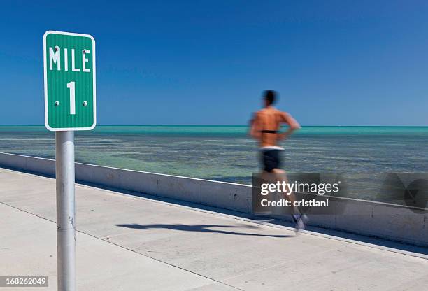 running - mile stockfoto's en -beelden