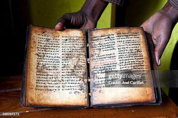 christian book in lake tana, ethiopia - lake tana stock pictures, royalty-free photos & images
