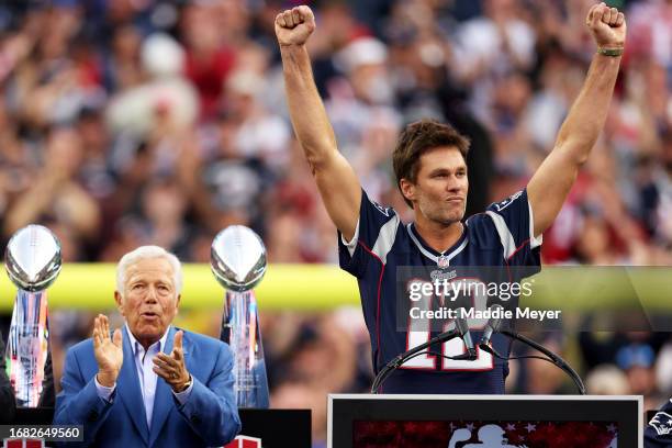 Former New England Patriots quarterback Tom Brady speaks next to Patriots Owner Robert Kraft during a ceremony honoring him at halftime of New...