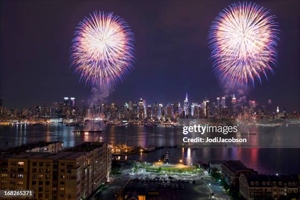 new york city syncronized fireworks - circa 4th century stock pictures, royalty-free photos & images