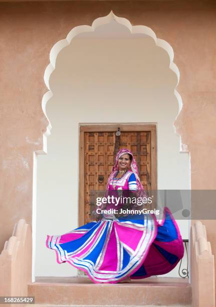 indian dancer woman twirling her skirt - rajasthan dance stock pictures, royalty-free photos & images