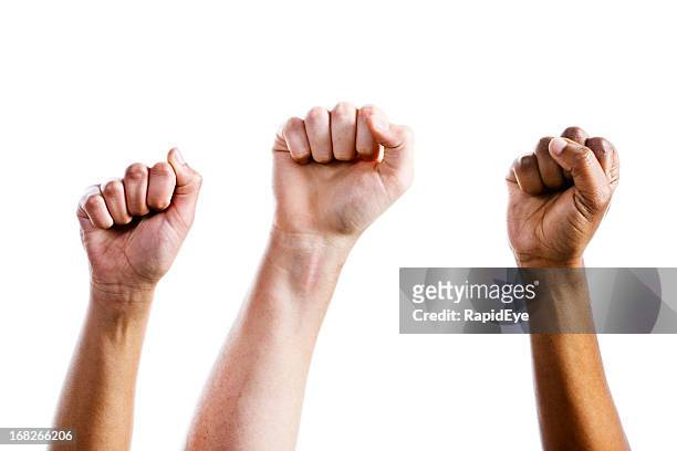 three clenched fists air punch in triumph or defiance - knytnäve bildbanksfoton och bilder