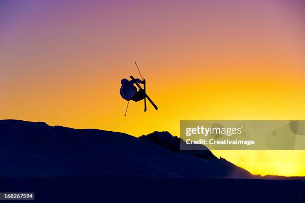 jump on sunset - skier silhouette stock pictures, royalty-free photos & images