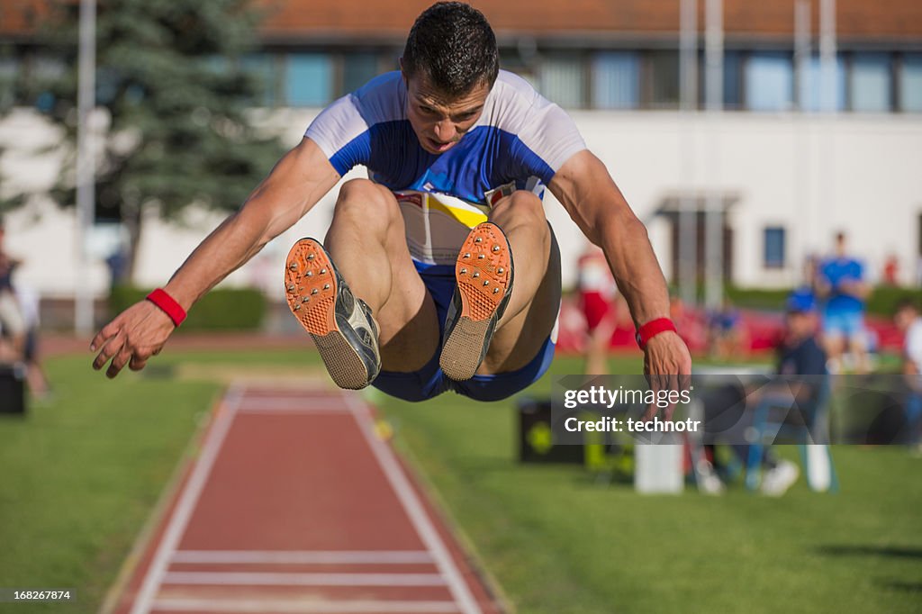 Young man at long jump